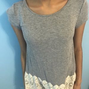Grey kids tee with white doily lace hem at bottom